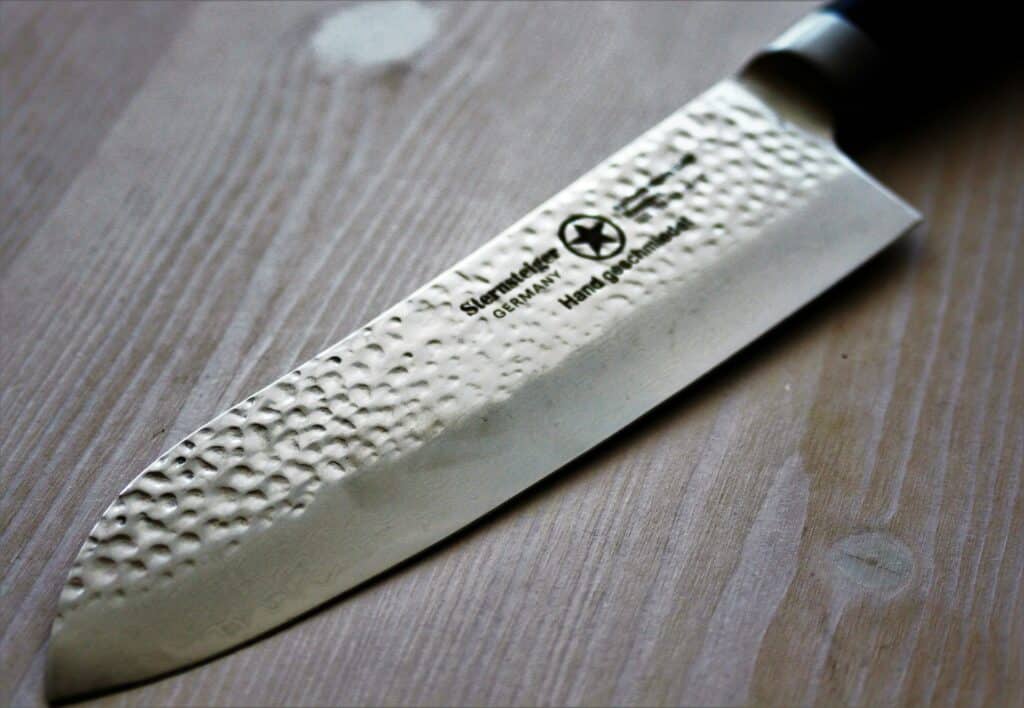 when must a knife be cleaned and sanitized